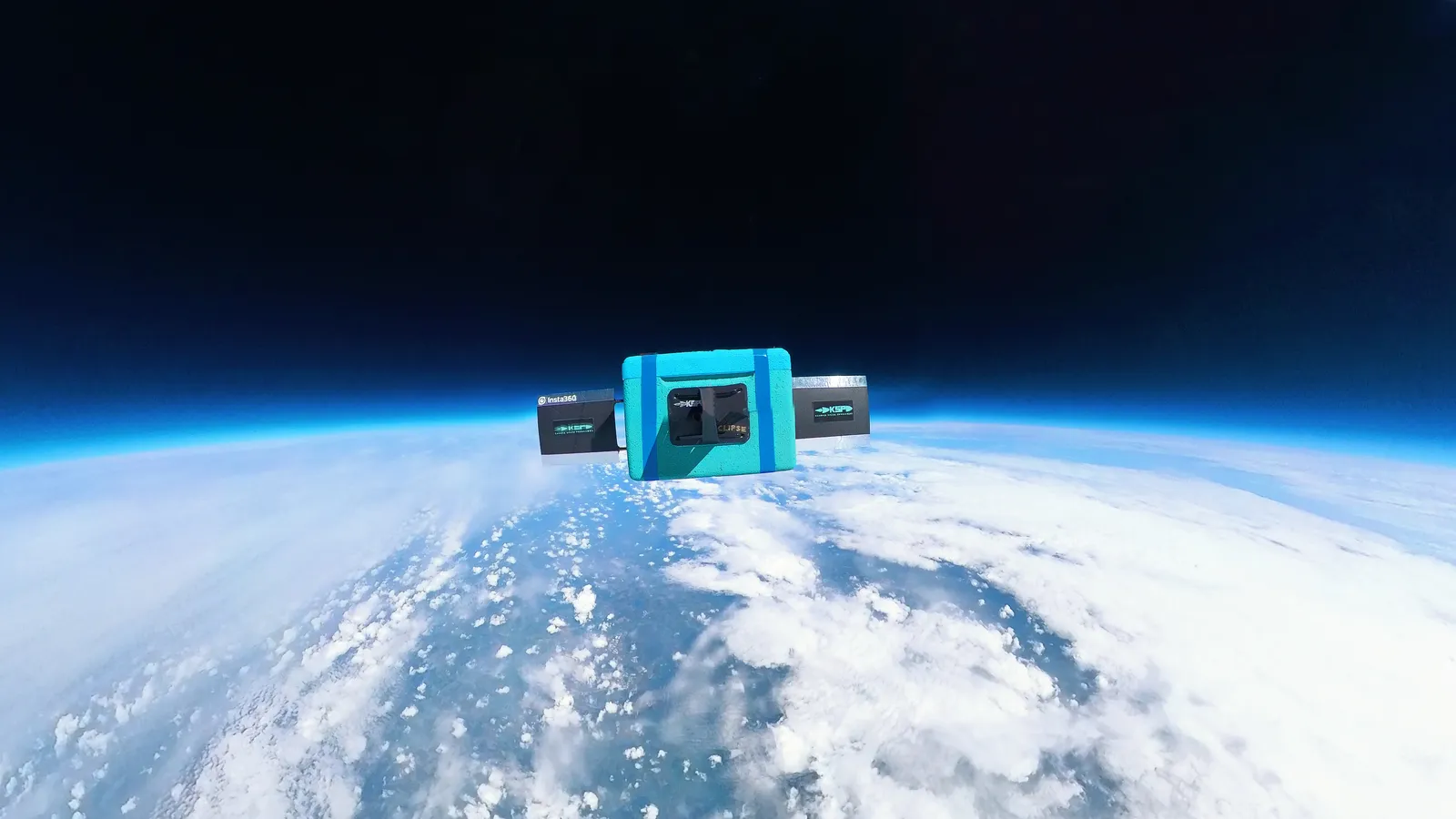 A KSP payload high above the clouds, the curve of the Earth below